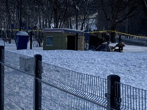 An encampment still stands next to a burned-out structure after a fire Wednesday, Feb. 17, 2021 in Corktown. A man was found dead.