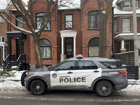 Toronto Police at the scene of a serious stabbing at a home on Berkeley St., just north of Shuter St., Thursday, Feb. 18, 2021.
