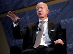 Jeff Bezos, president and CEO of Amazon and owner of The Washington Post, speaks at the Economic Club of Washington DC's "Milestone Celebration Dinner" in Washington, September 13, 2018.