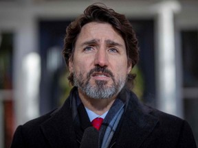 Prime Minister Justin Trudeau speaks during a COVID-19 briefing at Rideau Cottage in Ottawa, Dec. 18, 2020.