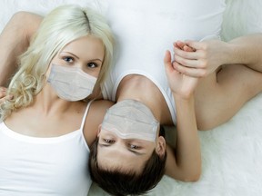 pretty couple in medical mask