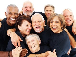 Elderly people standing together on white background
