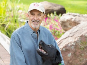 Phil Tedeschi, a human/animal connection expert, with his family dog