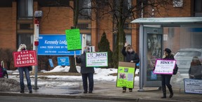 People demonstrate in support of the well-being of long-term care home residents outside of Kennedy Lodge Long Term Care Home in the Scarborough area in Toronto, Ont. on Saturday February 27, 2021.