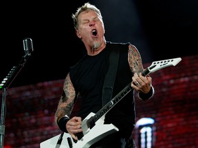 James Hetfield, lead vocalist of Metallica, performs during their World Magnetic tour concert in Abu Dhabi October 25, 2011.