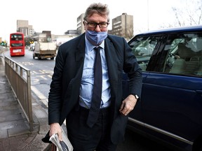 Crispin Odey arrives at Hendon Magistrates' Court to face one charge of indecent assault in Hendon, London, February 18, 2021.