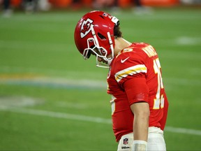Patrick Mahomes of the Kansas City Chiefs walks with his head down in the fourth quarter against the Tampa Bay Buccaneers in Super Bowl LV at Raymond James Stadium on Feb. 7, 2021 in Tampa, Fla.