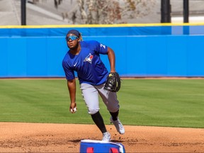 Blue Jays Vlad Guerrero Jr. field a ball at spring training camp on Wednesday.