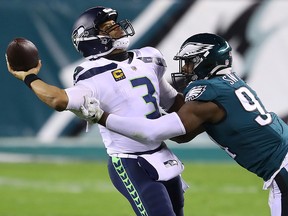 Javon Hargrave of the Philadelphia Eagles pressures Russell Wilson of the Seattle Seahawks at Lincoln Financial Field on November 30, 2020 in Philadelphia.