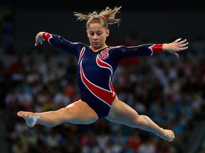 Shawn Johnson competes in the women's beam final at the National Indoor Stadium during the Beijing 2008 Olympic Games on August 19, 2008 in Beijing.
