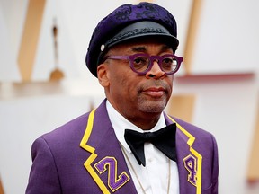 Director Spike Lee, wearing a coat with the number 24 in memory of NBA player Kobe Bryant, poses on the red carpet during the Oscars arrivals at the 92nd Academy Awards in Hollywood, Los Angeles February 9, 2020.