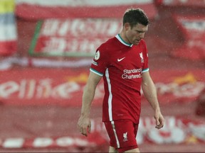 Liverpool's James Milner looks dejected after his team's 1-0 loss to Brighton & Hove Albion on Feb. 3, 2021.