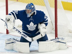 Toronto Maple Leafs goaltender Frederik Andersen blocks a shot during the third period against the Vancouver Canucks at Scotiabank Arena on Feb. 8, 2021. Andersen made 31 saves in Toronto's 3-1 victory.