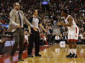 Toronto Raptors coach Nick Nurse and Kyle Lowry disagree with referee Andy Nagy during an NBA game in Toronto on  Dec. 3, 2019.
