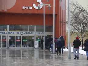 Small groups of people showed upon to Vaughan Mills Shopping Centre as York Region was put in the "red zone" for residents. Although a lot of people from just across the border came to return Christmas gifts and shop Monday February 22, 2021. Jack Boland/Toronto Sun/Postmedia Network