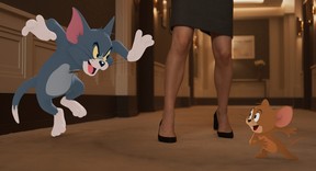 Tom the cat and Jerry the mouse in a scene from Tom and Jerry.