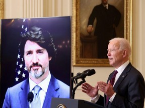 U.S. President Joe Biden and Canada's Prime Minister Justin Trudeau, appearing via video conference call, give closing remarks at the end of their virtual bilateral meeting from the White House in Washington, D.C., Tuesday, Feb. 23, 2021.