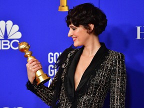 British actress Phoebe Waller-Bridge poses in the press room with her award during the 77th annual Golden Globe Awards on January 5, 2020, at The Beverly Hilton hotel in Beverly Hills