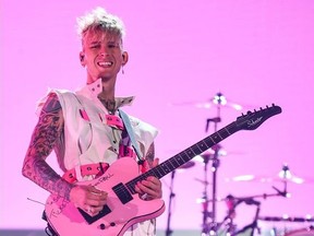 In this handout image courtesy of ABC singer Machine Gun Kelly performs during the 2020 American Music Awards at the Microsoft theatre on November 22, 2020 in Los Angeles.