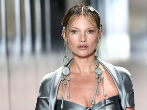 British model Kate Moss presents a creation of British designer Kim Jones for the Fendi's Spring-Summer 2021 collection during the Paris Haute Couture Fashion Week, in Paris, on January 27, 2021.