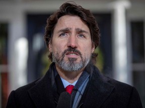 In this file photo taken on December 18, 2020 Canadian Prime Minister Justin Trudeau speaks during a Covid-19 briefing at the Rideau Cottage in Ottawa, Ontario.