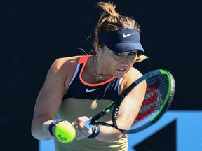 Spain's Paula Badosa hits a return against Russia's Liudmila Samsonova during their women's singles match on day two of the Australian Open tennis tournament in Melbourne on February 9, 2021.
