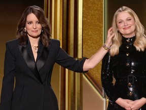Hosts Tina Fey (L) and Amy Poehler are sen in this handout screen grab from the 78th Annual Golden Globe Awards in Beverly Hills, California, U.S., February 28, 2021.