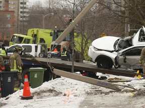 A GFL garbage truck demolished five cars, a light standard and damaged a home after it swerved up onto lawns and driveways along a stretch of Dixon Rd., near Royal York Rd., around 7 a.m. on Friday, Feb. 5, 2021.