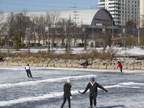 Ice skating along the Credit River, north of Lakeshore Rd. W., in Mississauga, Ont. on Thursday, Feb. 11, 2021.