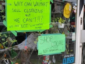 Expo Vintage Clothing on Dundas West, which has only been open for about a year -- pretty much when the pandemic started -- put up a sign this past Monday that reads: “Hey Tory/Ford, why can Walmart sell clothing but we can’t!!!? We are NOT ‘in this together’ anymore.”