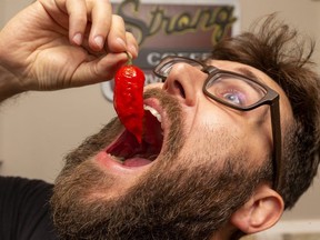 Mike Jack of London is in the Guinness book of world records several times for his ability to eat scorching hot peppers. (Mike Hensen/The London Free Press)
