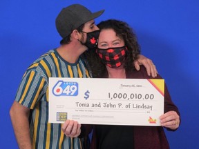 Lindsey man John Patterson and his wife Tonia with their $1-million 6/49 winnings.