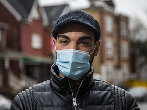 Mohamed Moussa, 37, seen here in Toronto, Ont., on Saturday, Feb. 27, 2021, is being hailed a hero after helping an elderly woman get her money and purse back from a crook armed with a box cutter and suffering multiple gashes in the process that needed stitched to close.