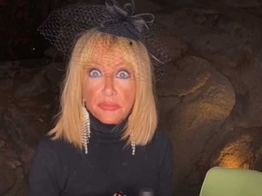 Suzanne Somers looks surprised in this screengrab of her Facebook Live video after it was interrupted by a home intruder.