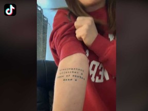 A TikTok user, who goes by @wakaflockafloccar, shows off her tattoo.