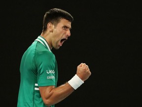 Serbia's Novak Djokovic celebrates winning the third set during his quarter final match against Germany's Alexander Zverev.