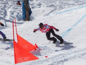 Éliot Grondin (red bib) in snowboard cross World Cup action earlier this month in Bakuriani, Georgia.