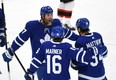 Toronto Maple Leafs forward Joe Thornton (left) celebrates a goal with teammates last month.