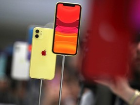 The new Apple iPhone 11 is displayed during a special event on September 10, 2019 in the Steve Jobs Theater on Apple’s Cupertino, California campus.
