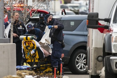 A person is loaded onto a stretcher after a gunman opened fire at a King Sooper's Grocery store on March 22, 2021 in Boulder, Colorado. Dozens of police responded to the afternoon shooting in which at least one witness described three people who appeared to be wounded, according to published reports.  (Photo by Chet Strange/Getty Images)