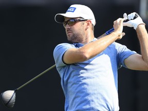 Corey Conners of Canada plays his shot from the 18th tee during the first round of the Arnold Palmer Invitational Presented by MasterCard at the Bay Hill Club and Lodge in Orlando.