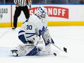 Toronto Maple Leafs’ goaltender Michael Hutchinson (30) makes a save on the Edmonton Oilers during first period NHL action at Rogers Place in Edmonton, on Monday, March 1, 2021.