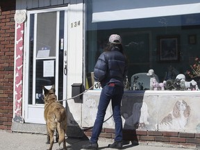 Red Carpet Hair Salon and Spa remained shut while the Le Chien Elegant dog groomers is open for business. The two shops are in the same building at the corner of Avenue Rd and Felbrig Ave in Toronto on Saturday, March 13, 2021.