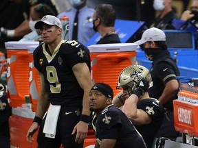 New Orleans' Jameis Winston (sitting) talked glowingly of Drew Brees on Tuesday.