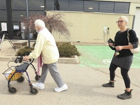 Sophie Jaremko, 86, with her daughter, Christine Jaremko, at the Toronto Congress Centre after Sophie received her immunization shot on March 17, 2021.