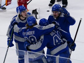 Four of the Maple Leafs’ five first-round picks between 2012-16 — from left Mitch Marner (2015), William Nylander (2014), Morgan Rielly (2012) and Auston Matthews (2016) — celebrate a goal against the Flames.