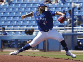 Blue Jays starting pitcher Alek Manoah delivers against the New York Yankees during the first inning at TD Ballpark on Sunday, March 14, 2021. KIM KLEMENT/USA TODAY SPORTS