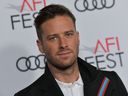 In this file photo taken on Nov. 8, 2018, Armie Hammer arrives for the AFI Opening Night World Premiere Gala Screening of