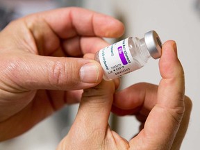 In this file photo taken on February 26, 2021 a vial of the AstraZeneca vaccine is seen.