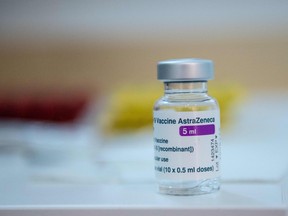 This photograph shows a vial of the AstraZeneca COVID-19 vaccine in a pharmacy in Paris on March 12, 2021.